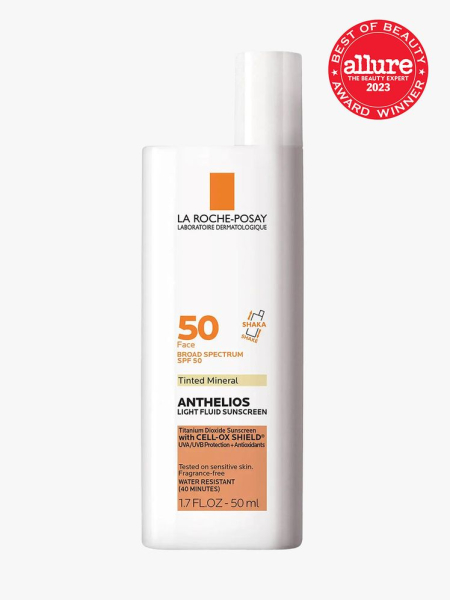 La Roche-Posay Anthelios Mineral Tinted Ultra Light Face Sunscreen Fluid SPF 50 white rectangle bottle with cap to the right on light gray background with red Allure Best of Beauty seal in the top right corner